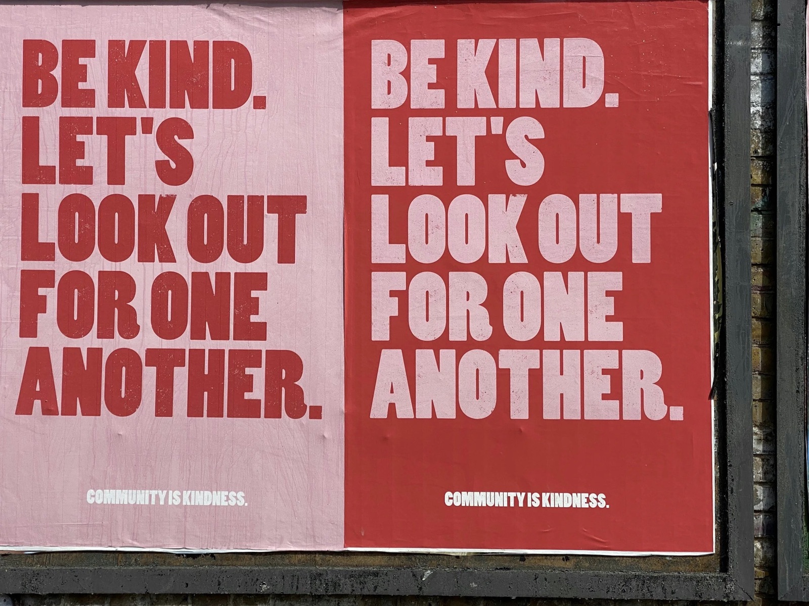 Red poster reading Be kind. Let's look out for one another. Community is kindness.